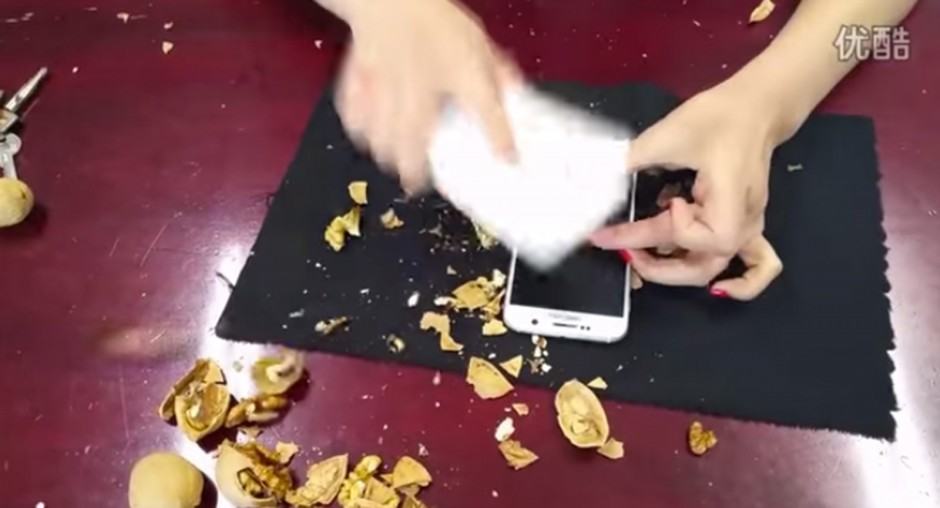 Who knew you could crack walnuts with a Samsung Galaxy S6? Photo: S6 Tester/YouTube